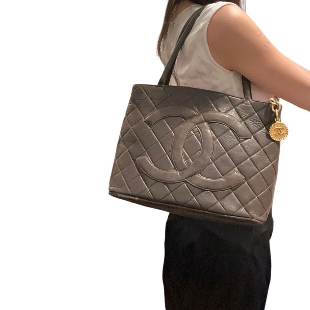 CHANEL Brown Quilted Shoulder Bag with Gold Accents